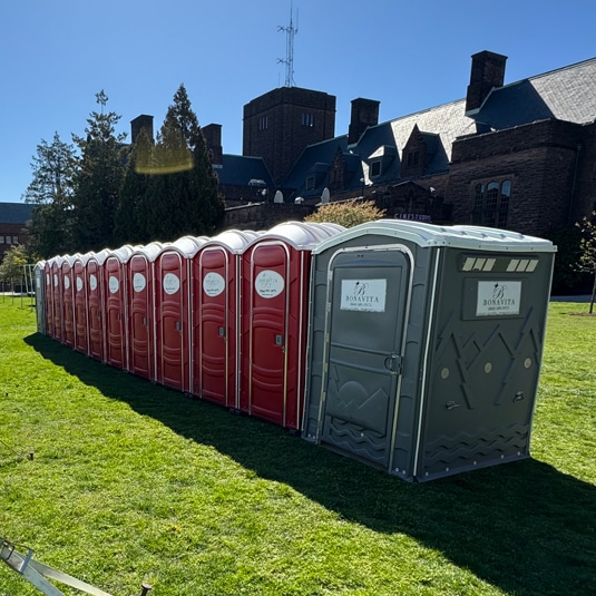 Bonavita Site Solutions - Portable Restroom Units lined at an outdoor corporate event